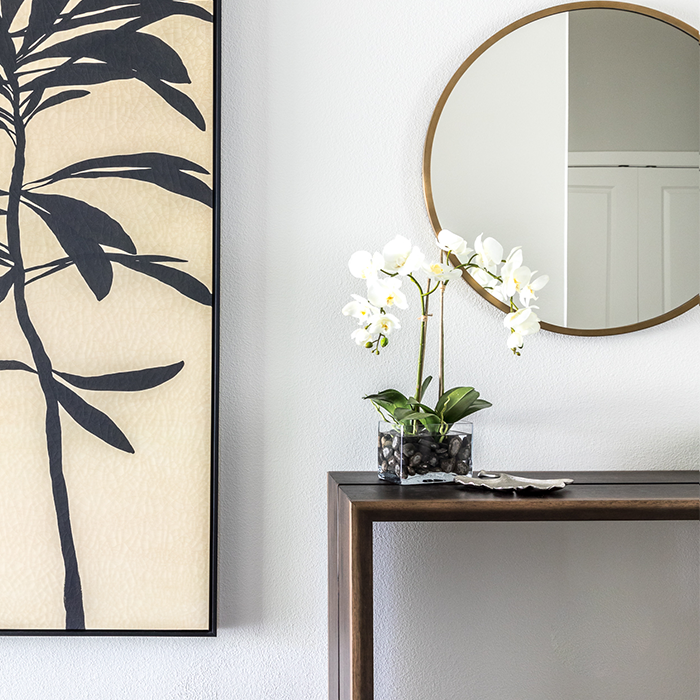 Florals Zen style entry console and art.